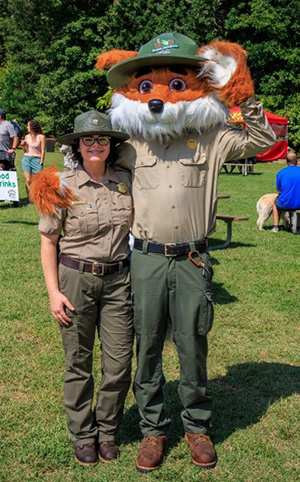 Park Manager Amelia Hulth with Parker Redfox
